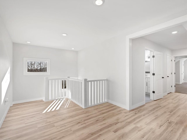 hallway featuring light wood-type flooring