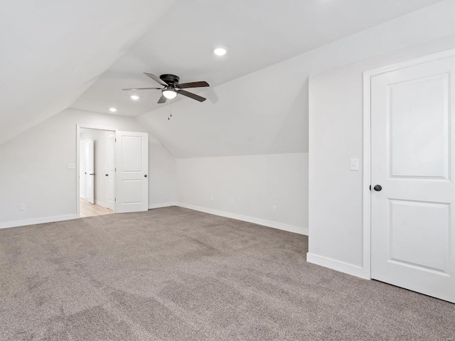 bonus room featuring light colored carpet, ceiling fan, and lofted ceiling