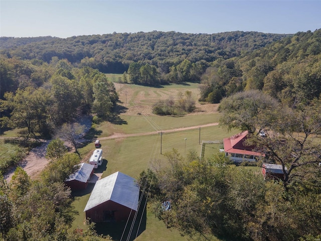 birds eye view of property featuring a rural view