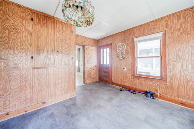 entrance foyer with wood walls