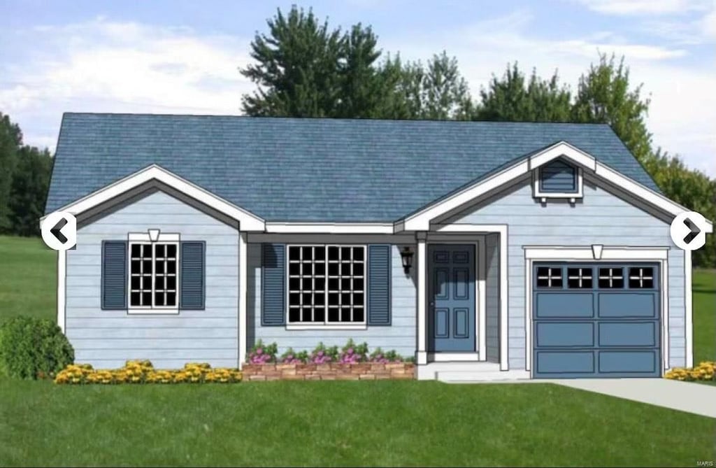 view of front of house with a front yard and a garage