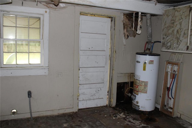 utility room with gas water heater