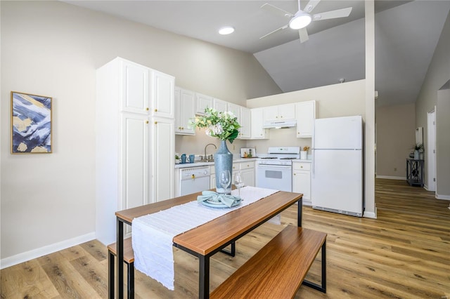 kitchen featuring ceiling fan, sink, light hardwood / wood-style flooring, white appliances, and white cabinets