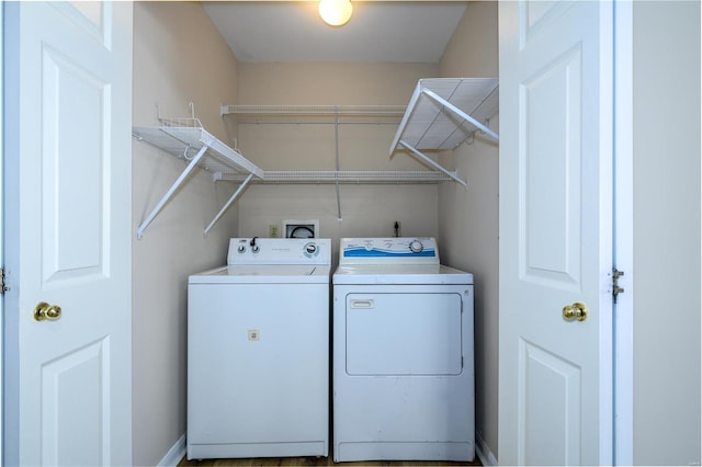 laundry area featuring washing machine and dryer