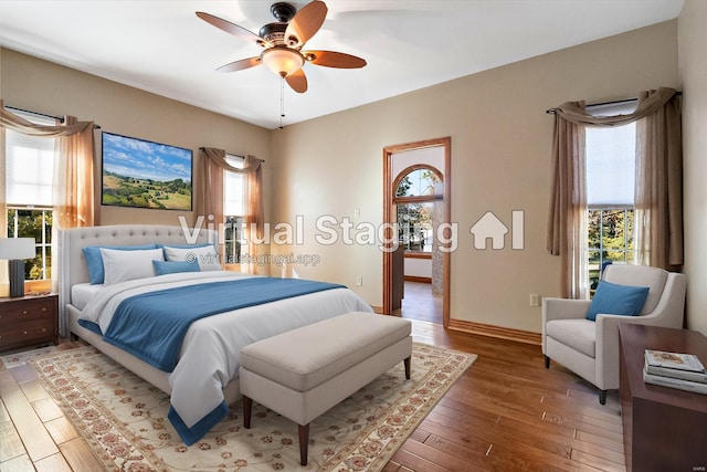 bedroom featuring hardwood / wood-style floors and ceiling fan