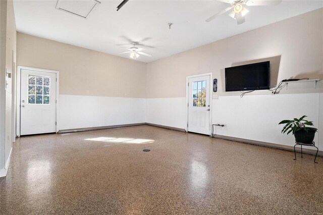 interior space featuring ceiling fan