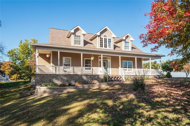 farmhouse-style home featuring a porch and a front yard