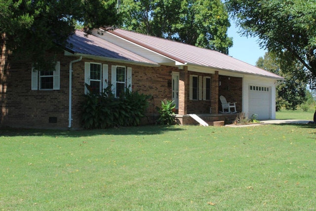 ranch-style house with a front yard and a garage