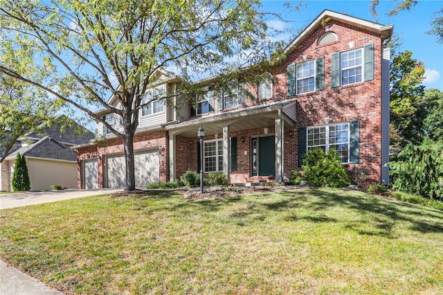 view of front of property featuring a front yard and a garage