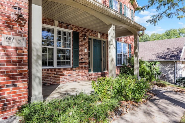 doorway to property with covered porch