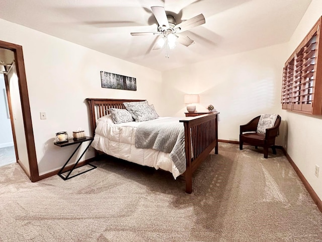 bedroom with ceiling fan and carpet flooring