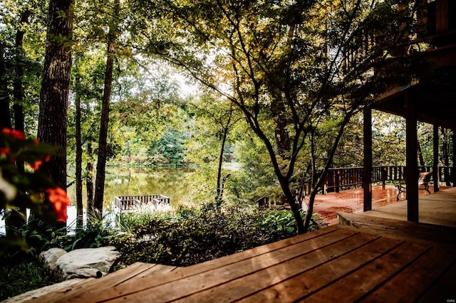 deck featuring a water view