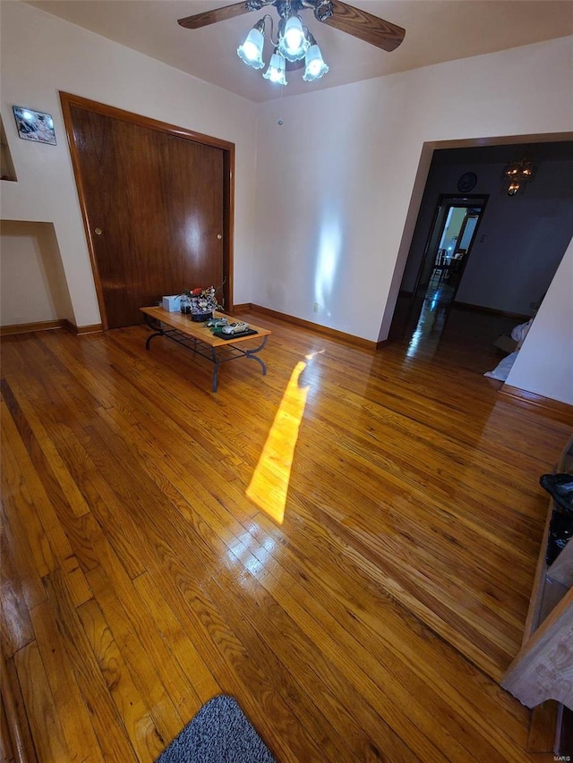 interior space with hardwood / wood-style flooring and ceiling fan