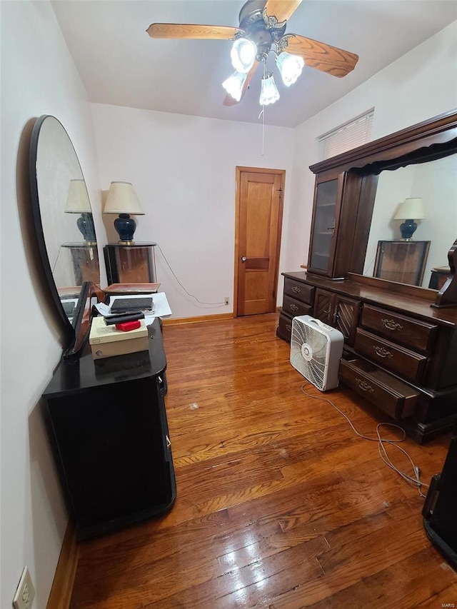 interior space featuring ceiling fan and hardwood / wood-style floors