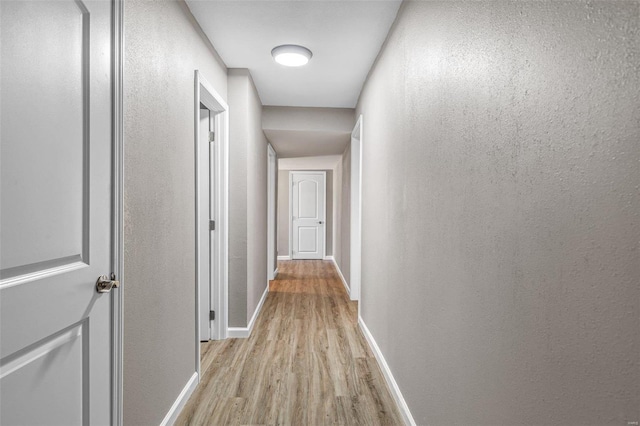 hall featuring light wood-type flooring