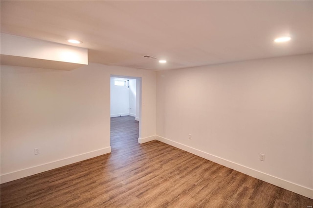 empty room with wood-type flooring