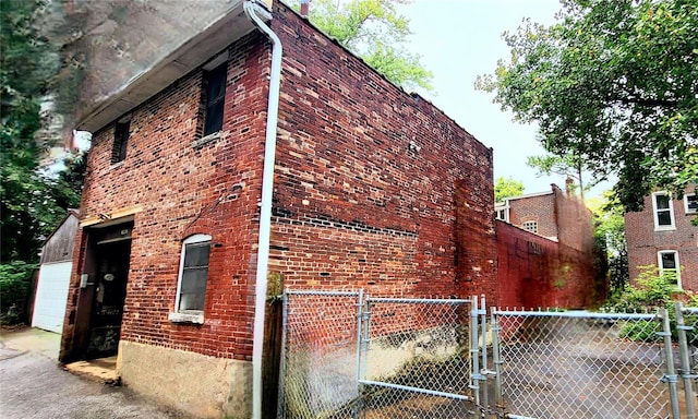 view of property exterior featuring a garage