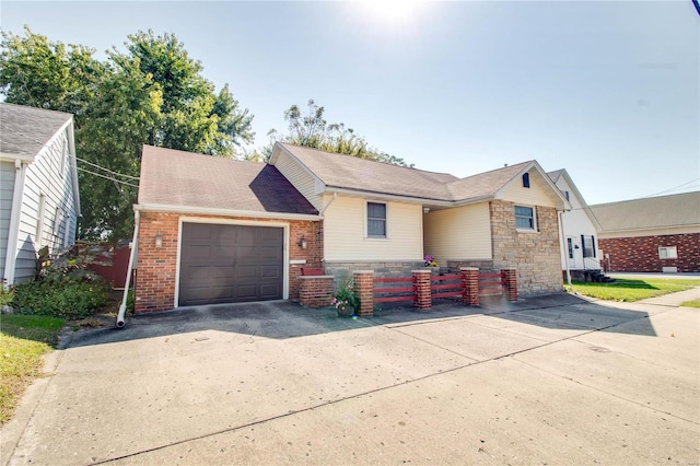 view of front of property featuring a garage