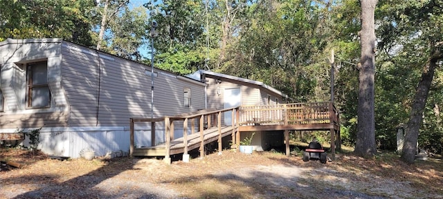 rear view of house with a deck