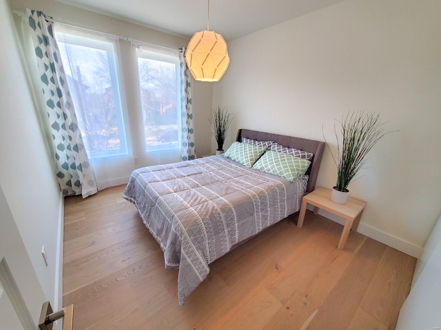 bedroom featuring light hardwood / wood-style floors