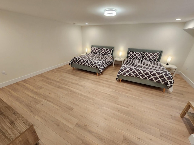 bedroom with light hardwood / wood-style floors