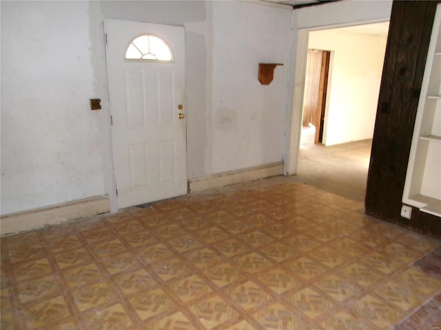 entrance foyer with light parquet floors