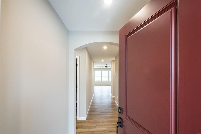 hallway with light wood-type flooring