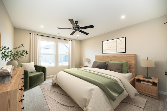 carpeted bedroom featuring ceiling fan