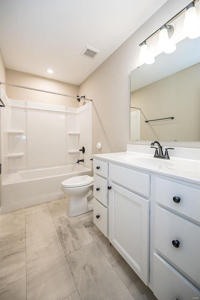 full bathroom featuring vanity, toilet, and washtub / shower combination