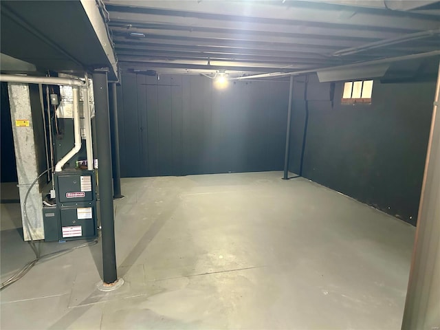 basement featuring heating unit