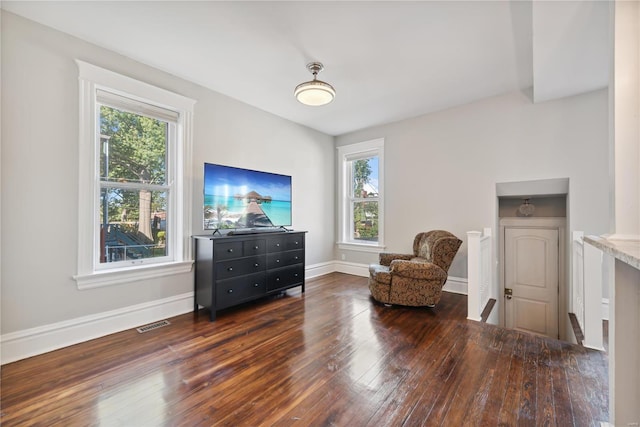 living area featuring dark hardwood / wood-style floors