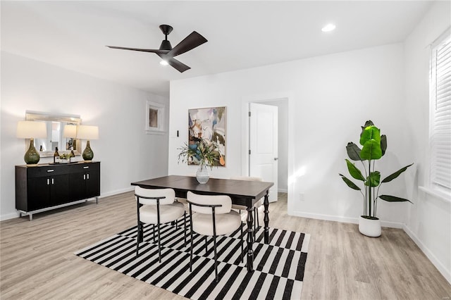 dining room featuring ceiling fan and light hardwood / wood-style floors