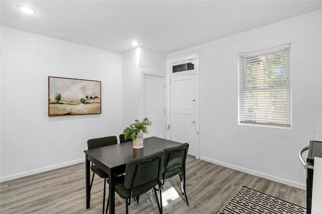 dining area with light wood-type flooring