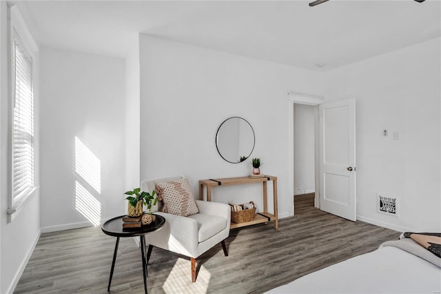 sitting room with hardwood / wood-style floors