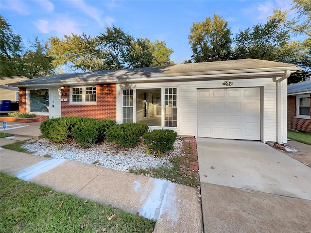 ranch-style home with a garage