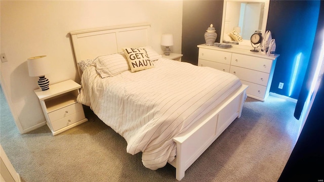 bedroom with light colored carpet