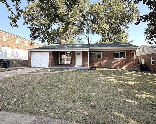 ranch-style home featuring a porch, a garage, and a front yard