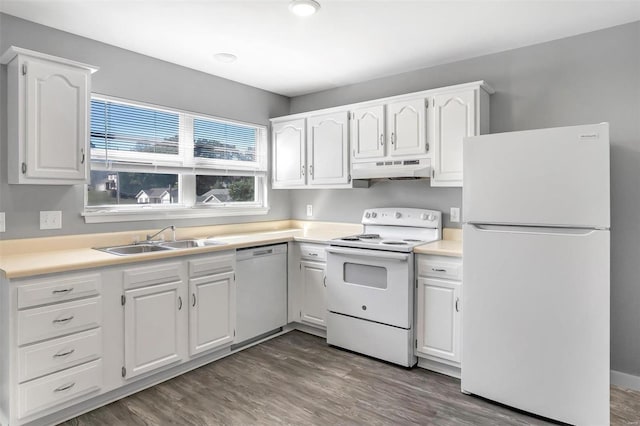 kitchen featuring white appliances, white cabinetry, sink, and dark wood-type flooring