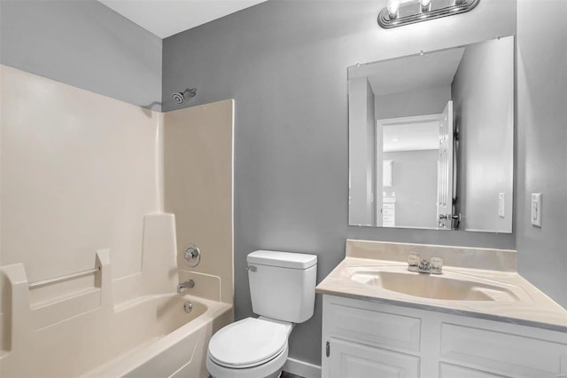 full bathroom with  shower combination, vanity, and toilet