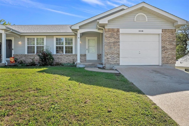 single story home with a garage and a front lawn