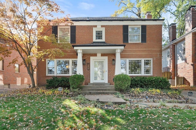 view of front facade with a front yard