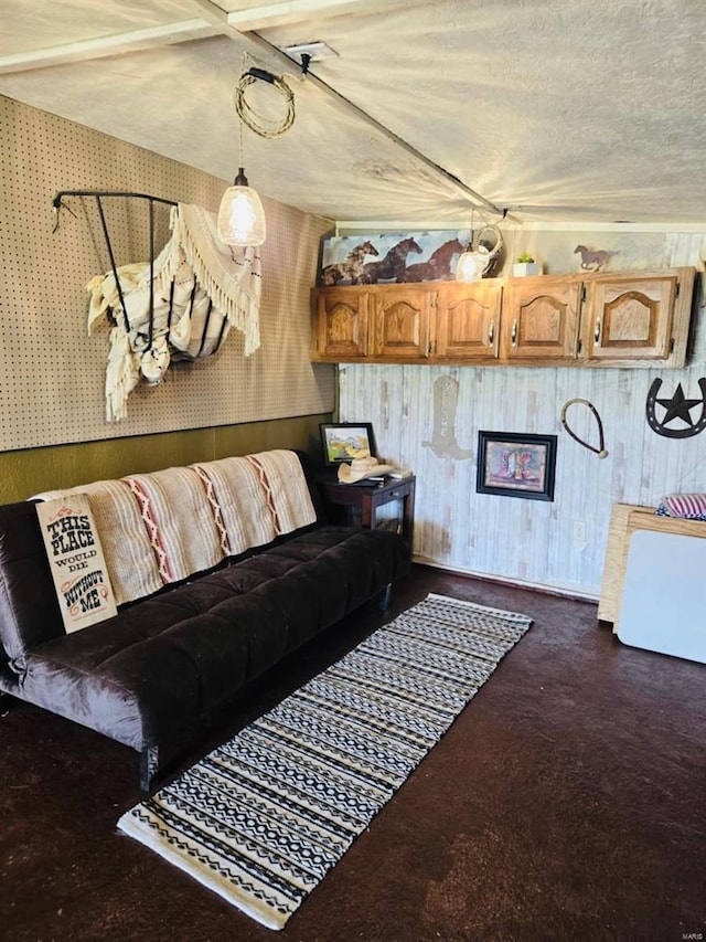 living room with wood walls