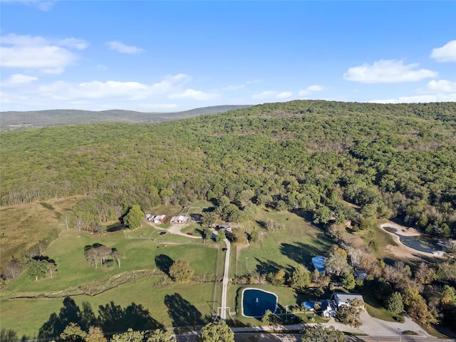 bird's eye view featuring a view of trees