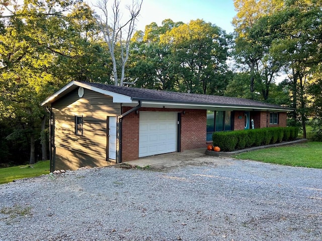 single story home with a garage