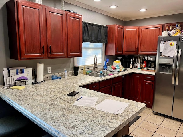 kitchen with light tile patterned floors, ornamental molding, sink, and stainless steel fridge with ice dispenser