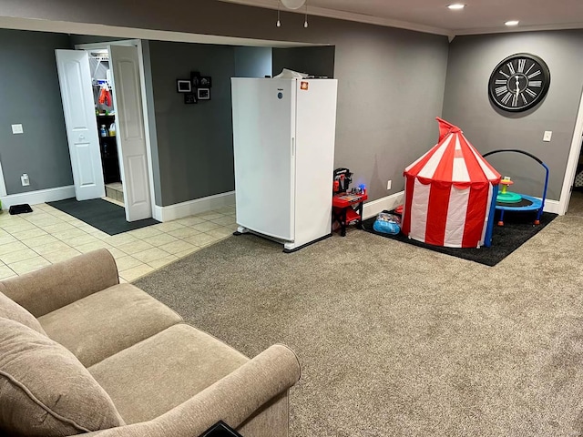 playroom with light tile patterned flooring and crown molding