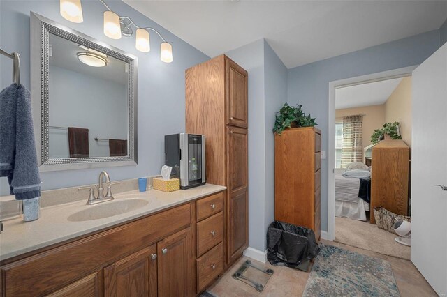 bathroom featuring tile patterned floors and vanity