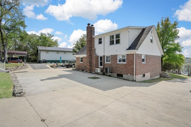 exterior space featuring a carport