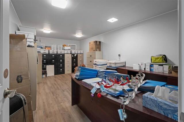 office area with wood-type flooring