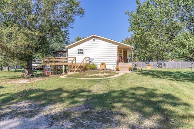 view of yard with a deck